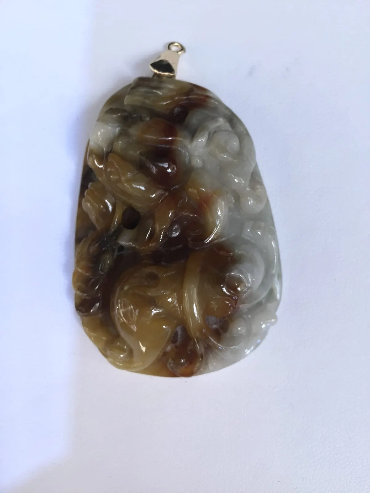 Carved Brown & White Jade Pendant