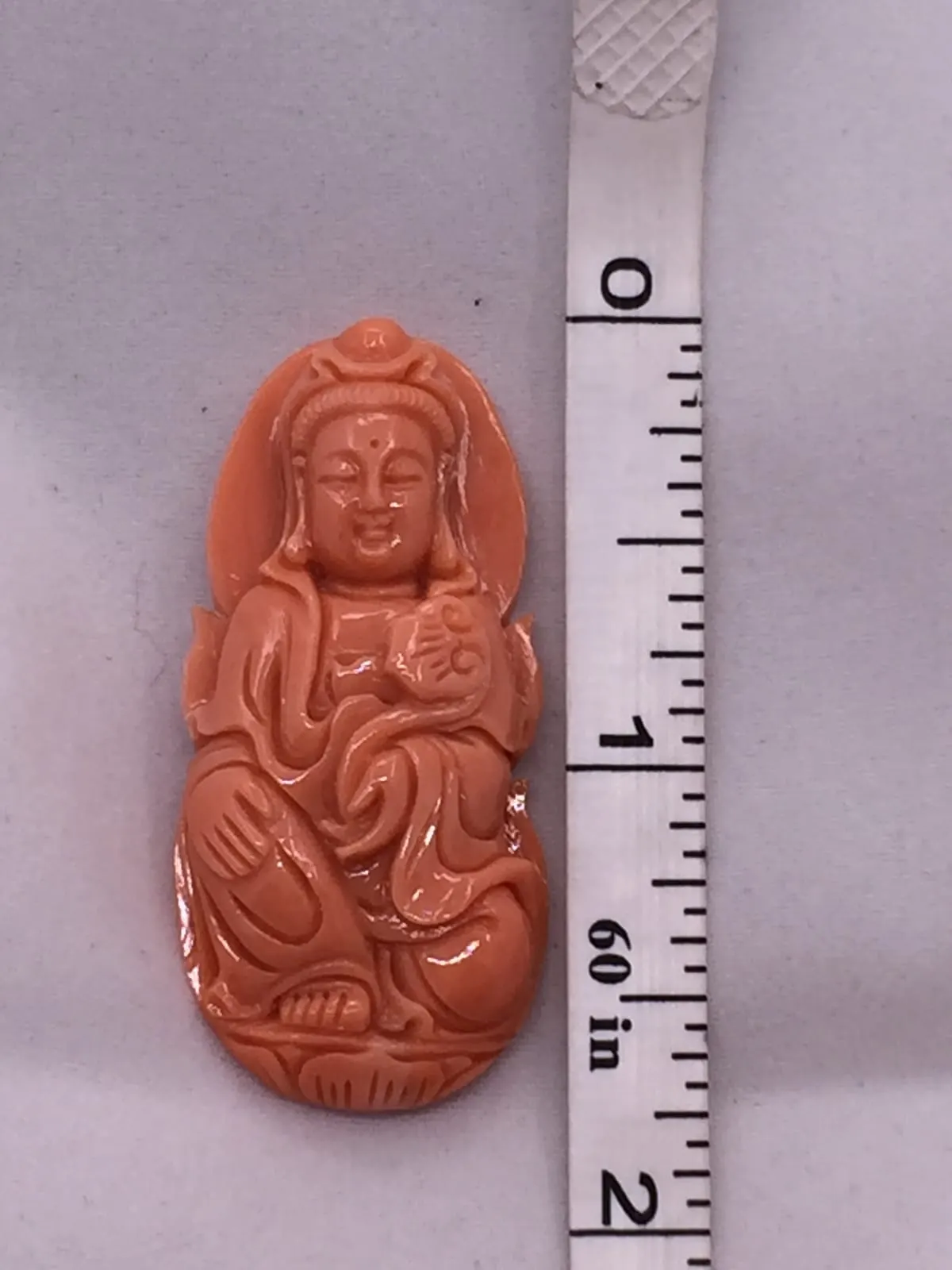 Carved Coral Guanyin Pendant