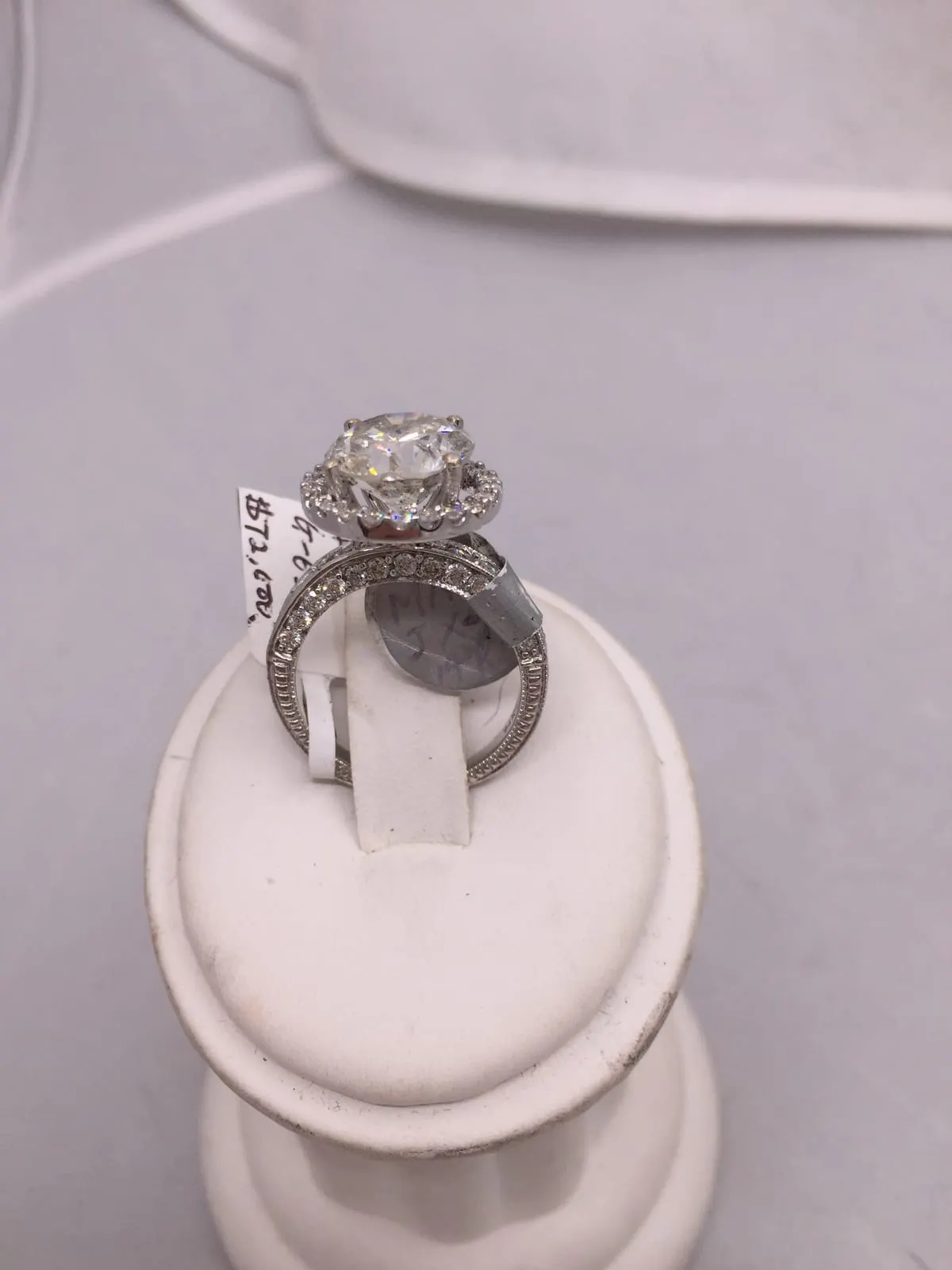 Diamond Halo Solitaire Engagement Ring — $72,600
