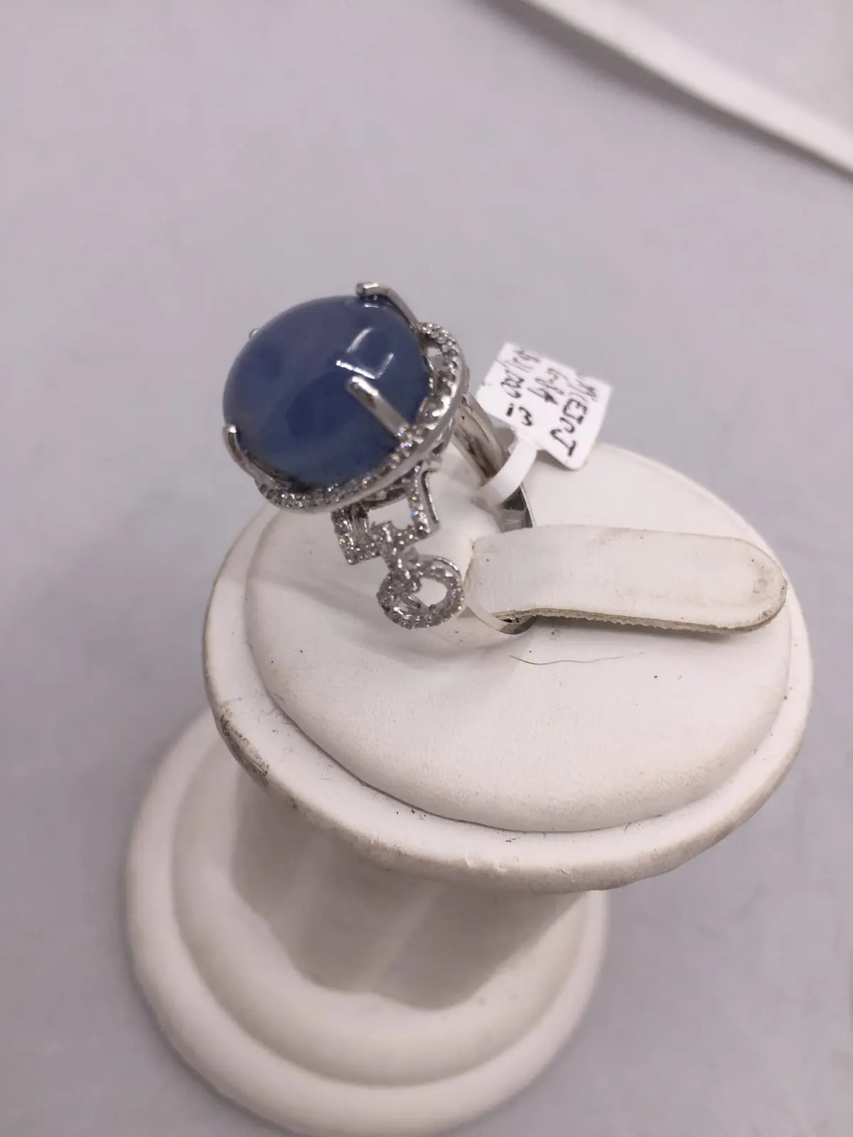 Star Sapphire Ring with Diamond Key Charm — $31,000