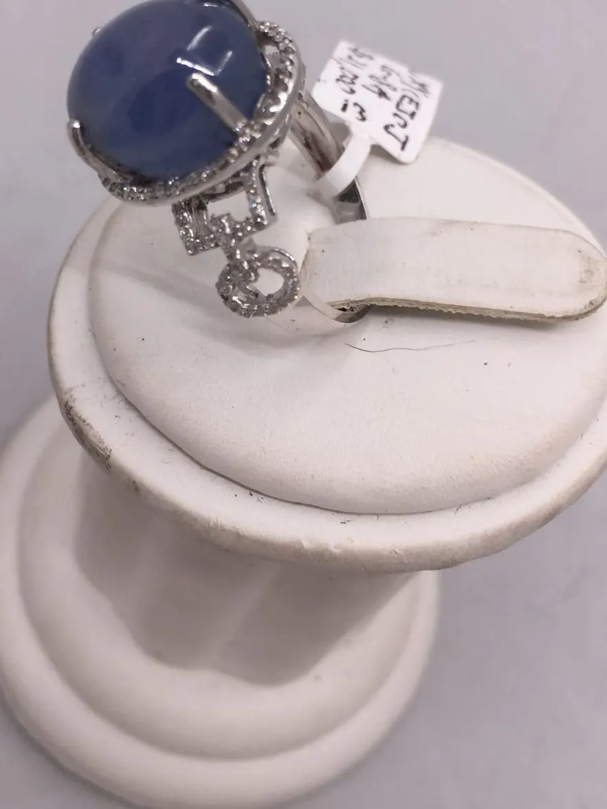 Star Sapphire Ring with Diamond Key Charm — $31,000